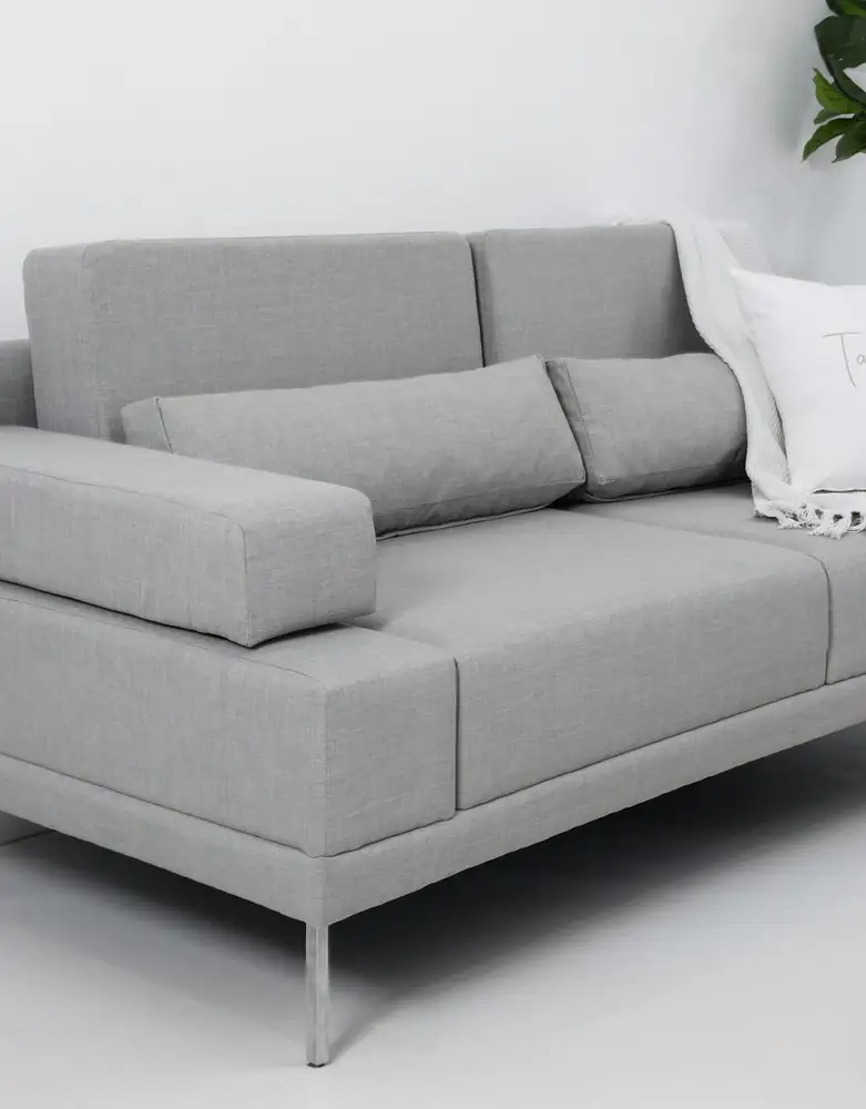 grey-sofa-with-throw-pillows.webp