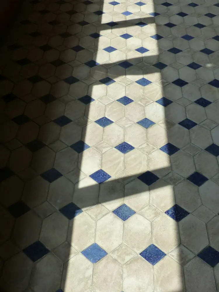 white-blue-tiled-floor.webp